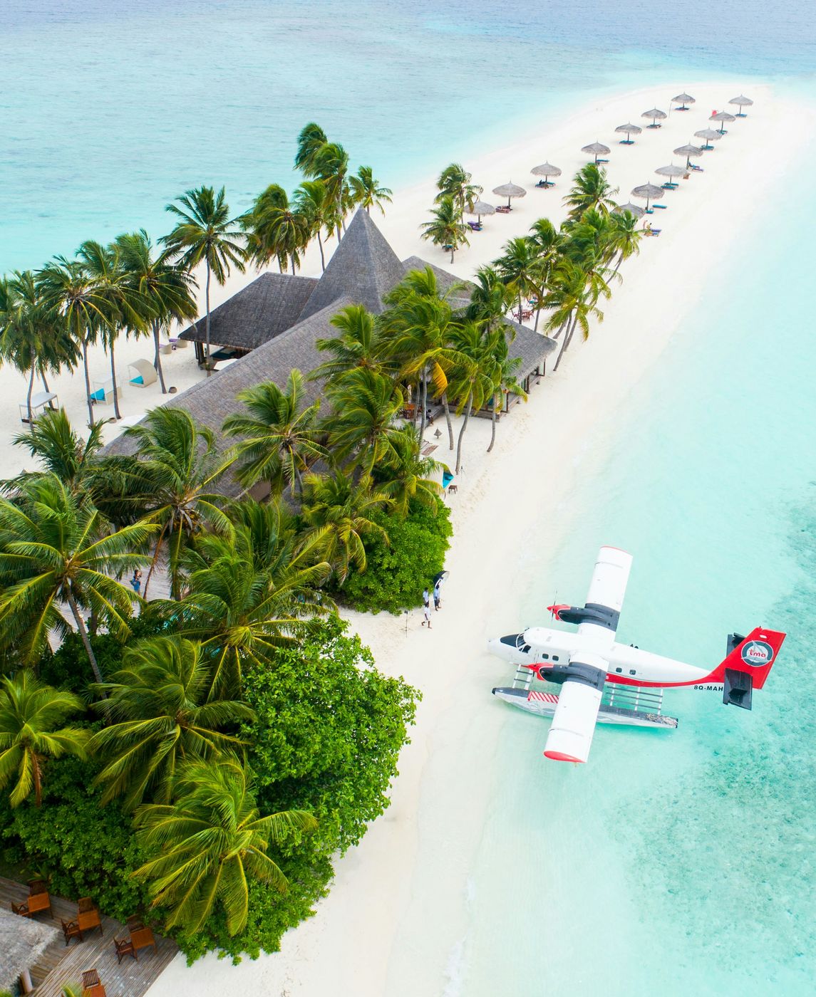 Hydravion sur un lagon turquoise, Maldives